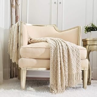 Manta artesanal tejida beige suave para sofá