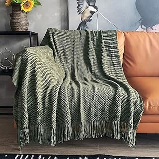 Manta artesanal tejida con borlas textura burbuja